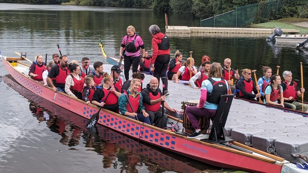 Teams in their boats preparing for the race