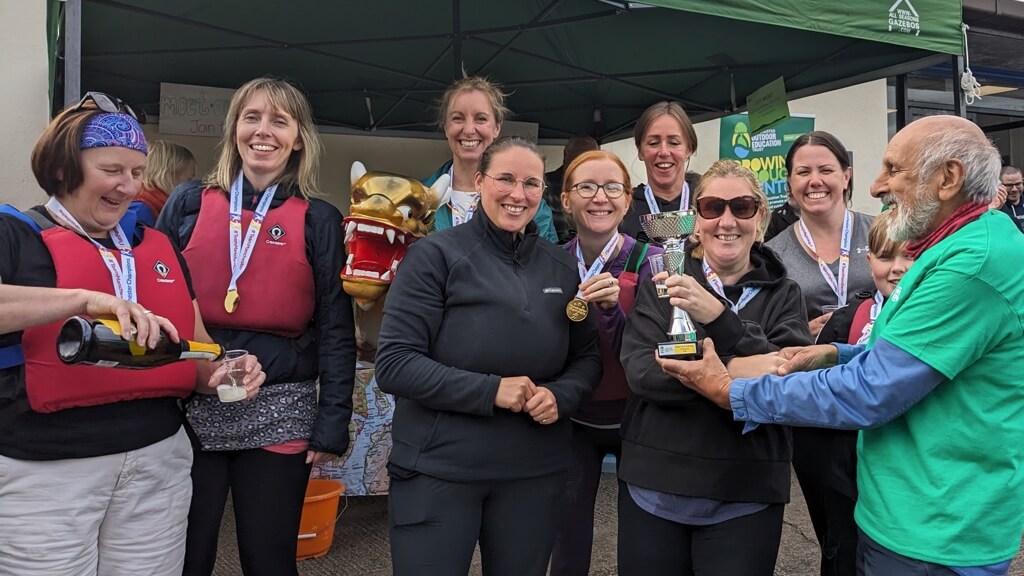 Trophy presentation to the Dragon Boat Race team winners 2023