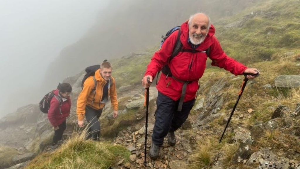 Hikers climbing the hills in the Lake District